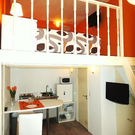 Orange Suite Studio Amesterdão Quarto foto